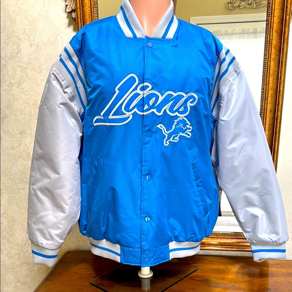 New Detroit Lions Blue and gray NFL team apparel jacket. Size L. Snap front.